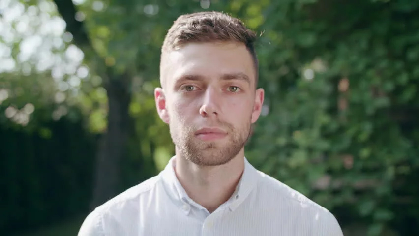 Portrait of a man in a light shirt